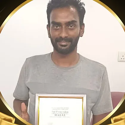 Mr. Prem of Mutiara Niaga Poultry with his certificate